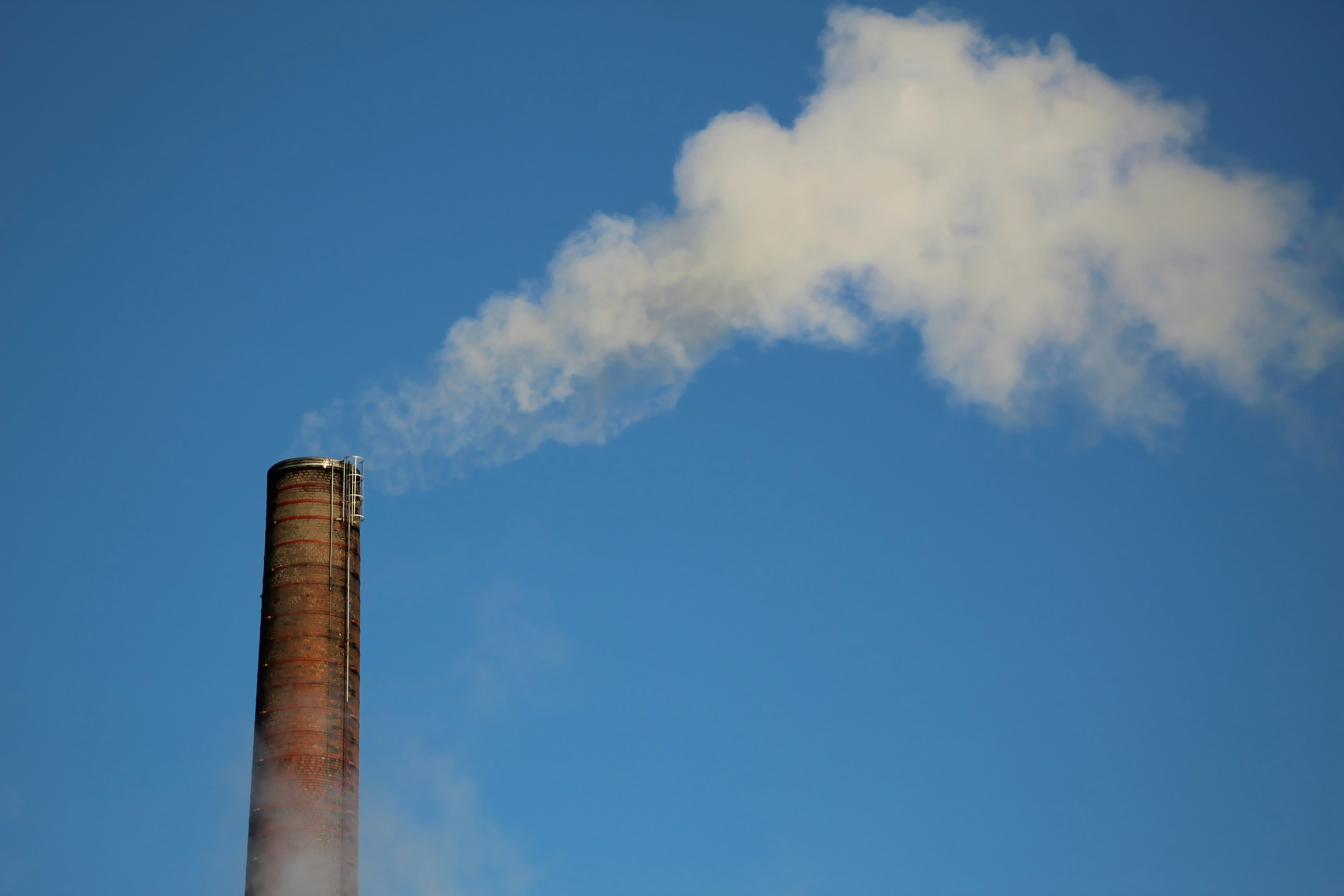 Smokestack emissions representing corporate decarbonisation